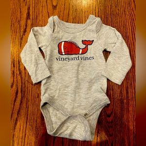 Vineyard Vines football whale onesie.